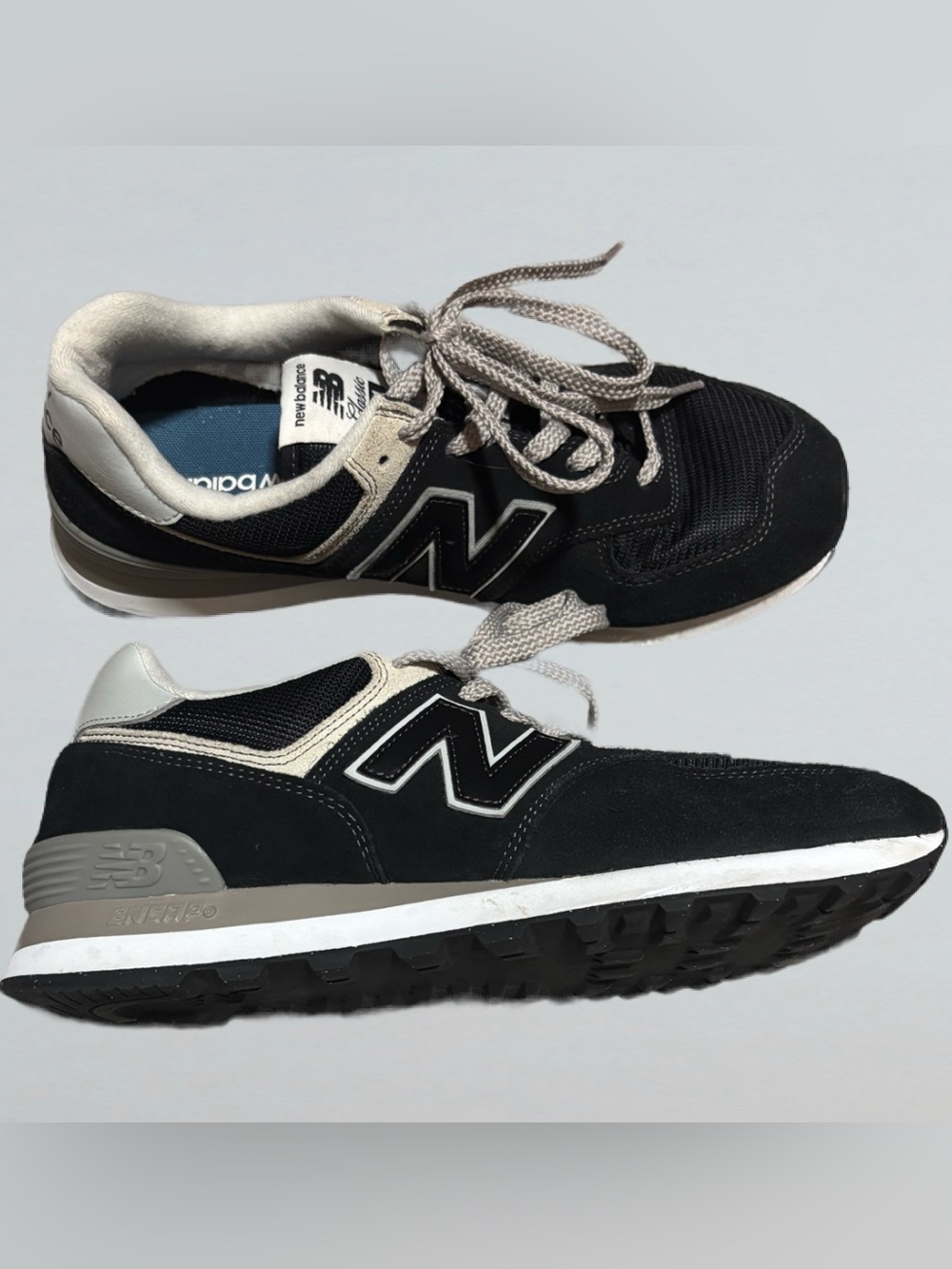 Black and Gray New Balance 574 Sneakers